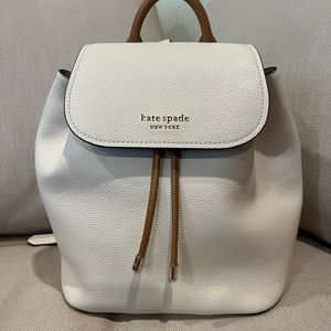 Kate Spade Sinch Women’s Medium Sinch Pebbled-Leather Backpack in milk glass